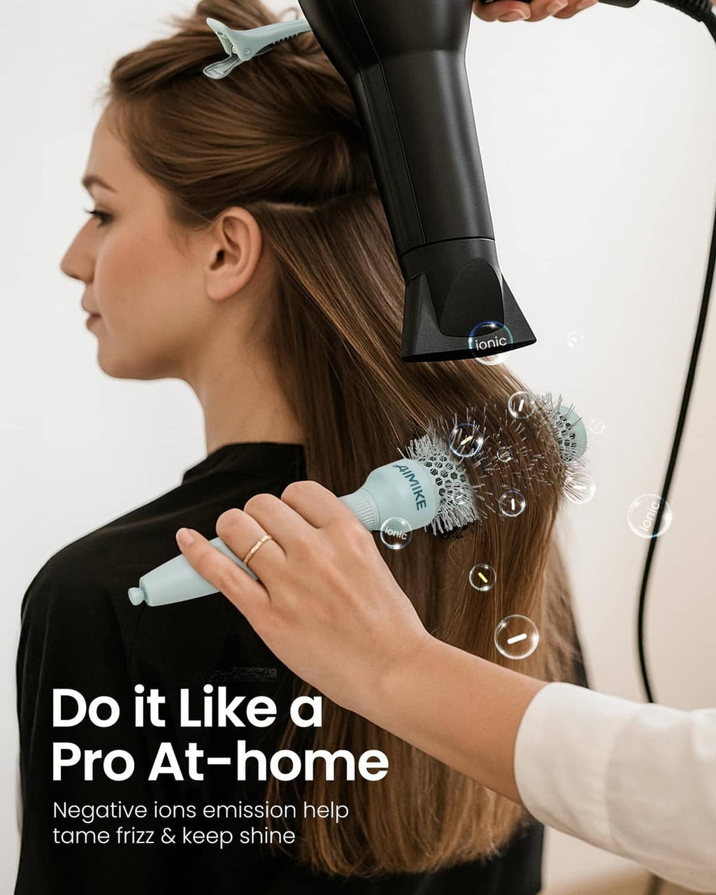 Teal round blowout brush with vented nylon bristles for hair styling