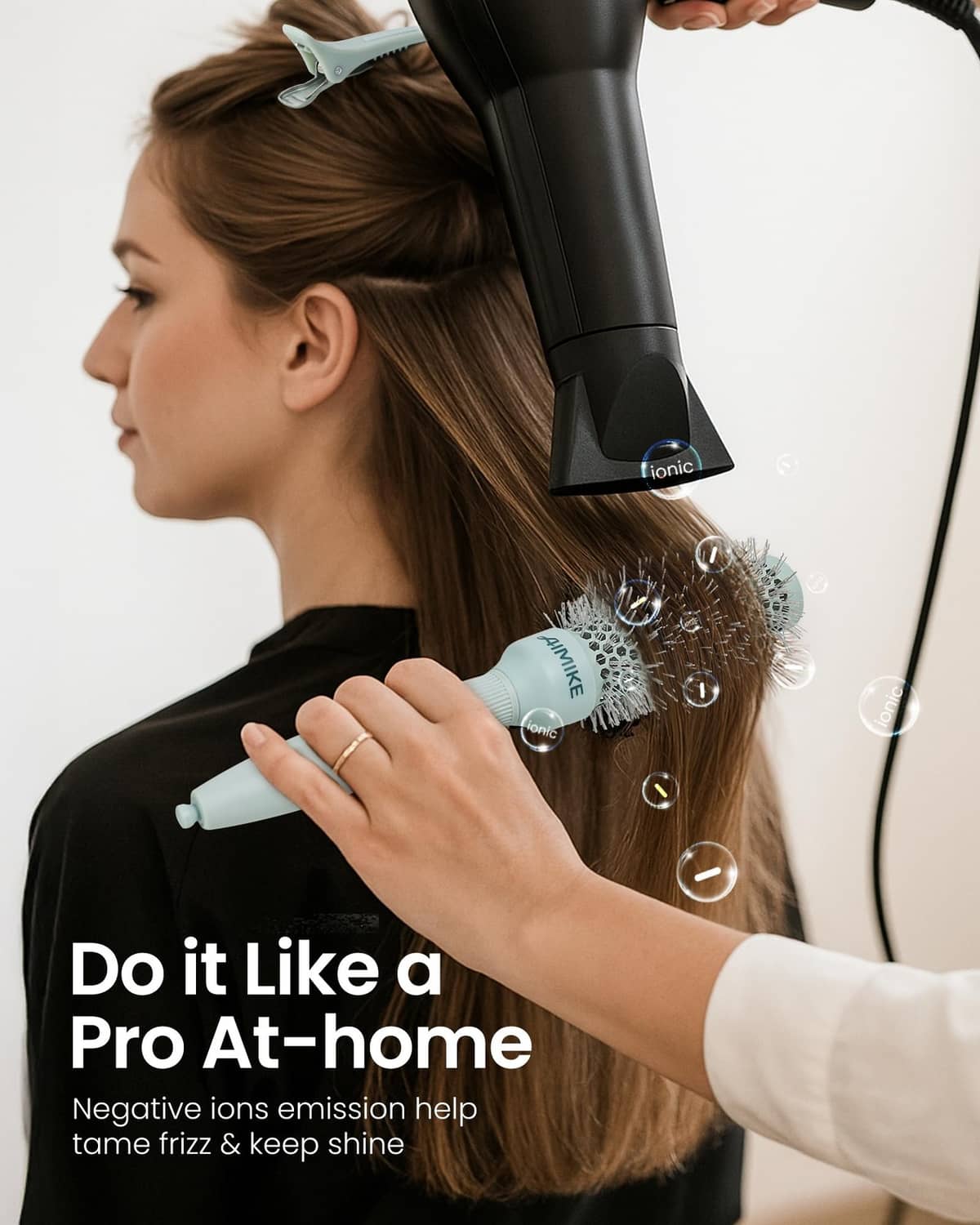 Teal round blowout brush with vented nylon bristles for hair styling