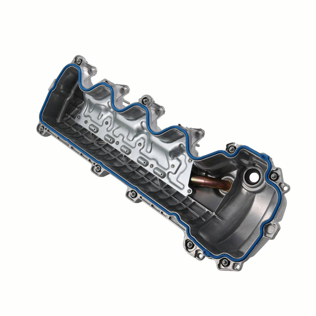 Engine valve cover with blue gasket outline and internal channeling, side view