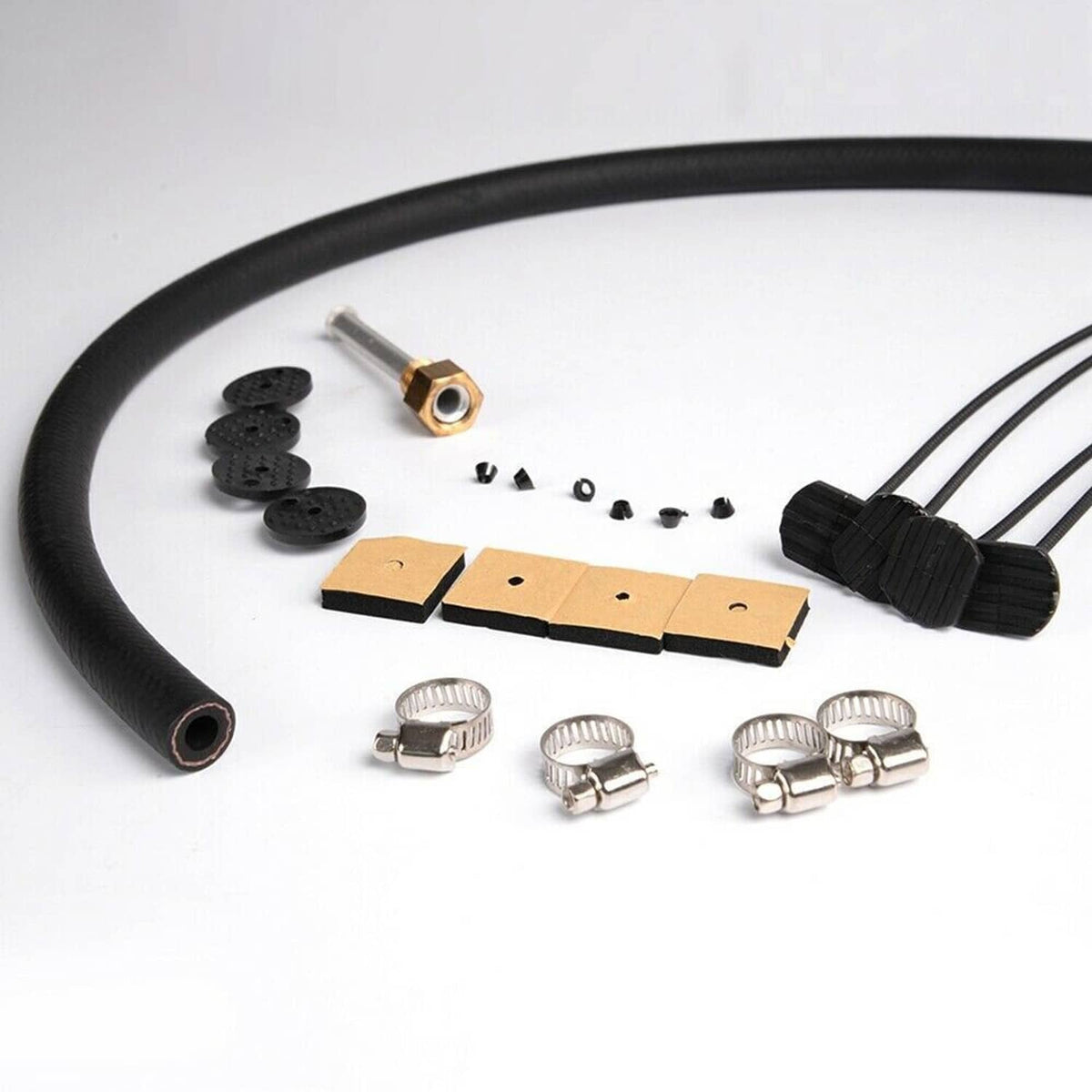 Black transmission hose with fittings, clamps, washers, and mounting plates