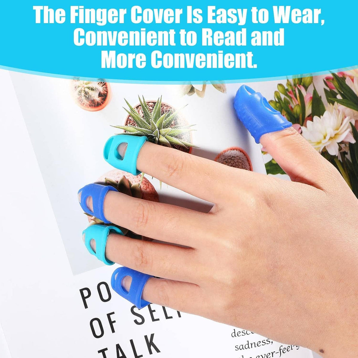 Hands wearing blue silicone fingertip protectors while reading paper