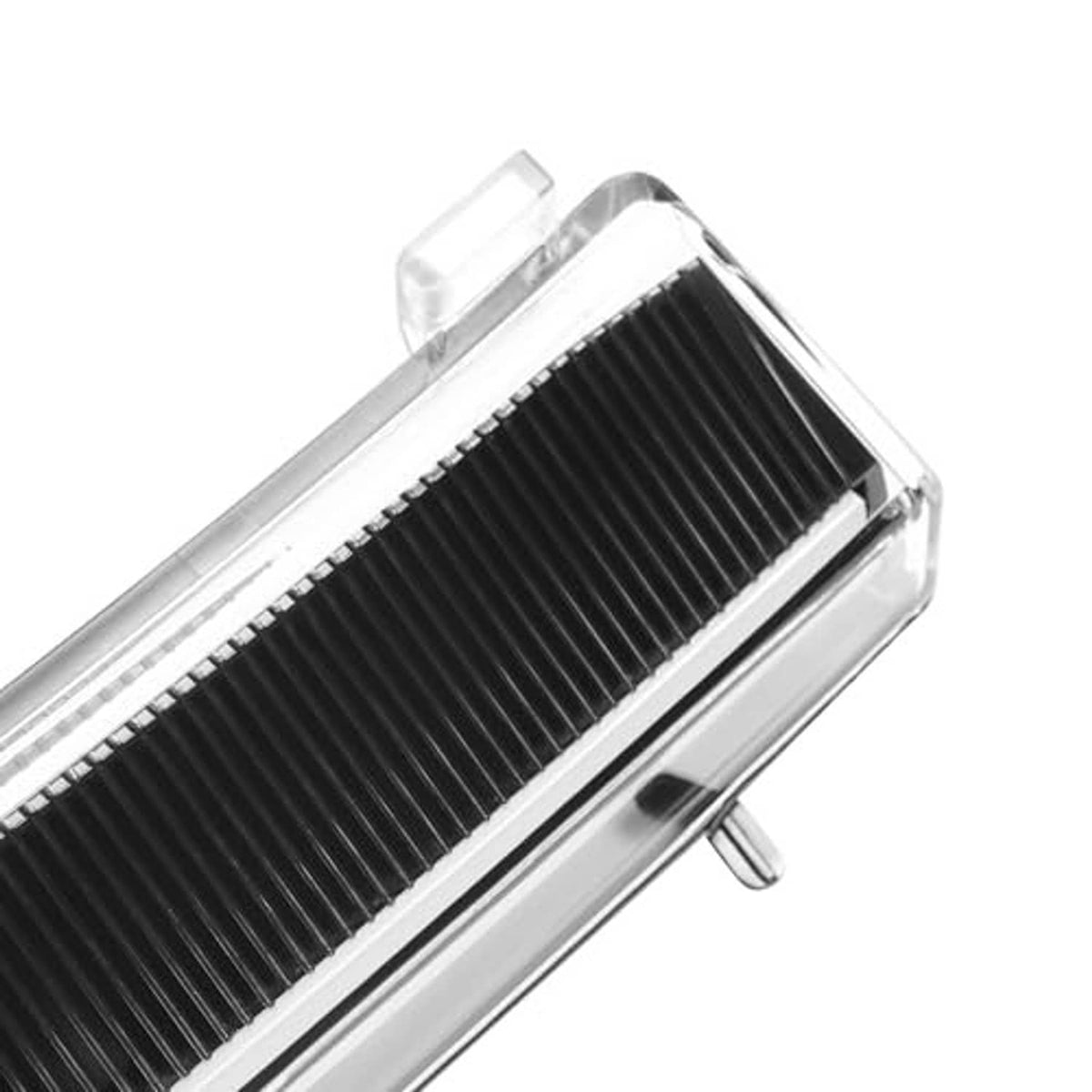 Close-up of clear-lens turn signal light with black internal LED strip