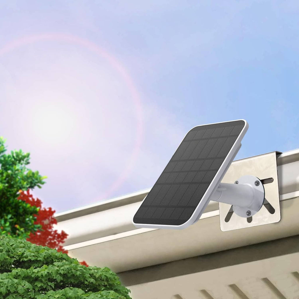 Stainless steel bracket securing a solar-powered security camera on eave