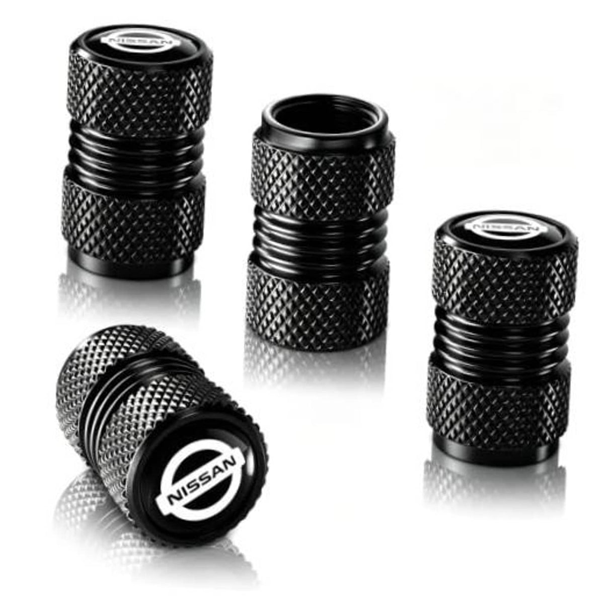 Black textured tire valve stem caps with Nissan logo, set of 3