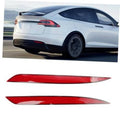 Red rear bumper reflector lens set for Tesla Model Y, shown on the car