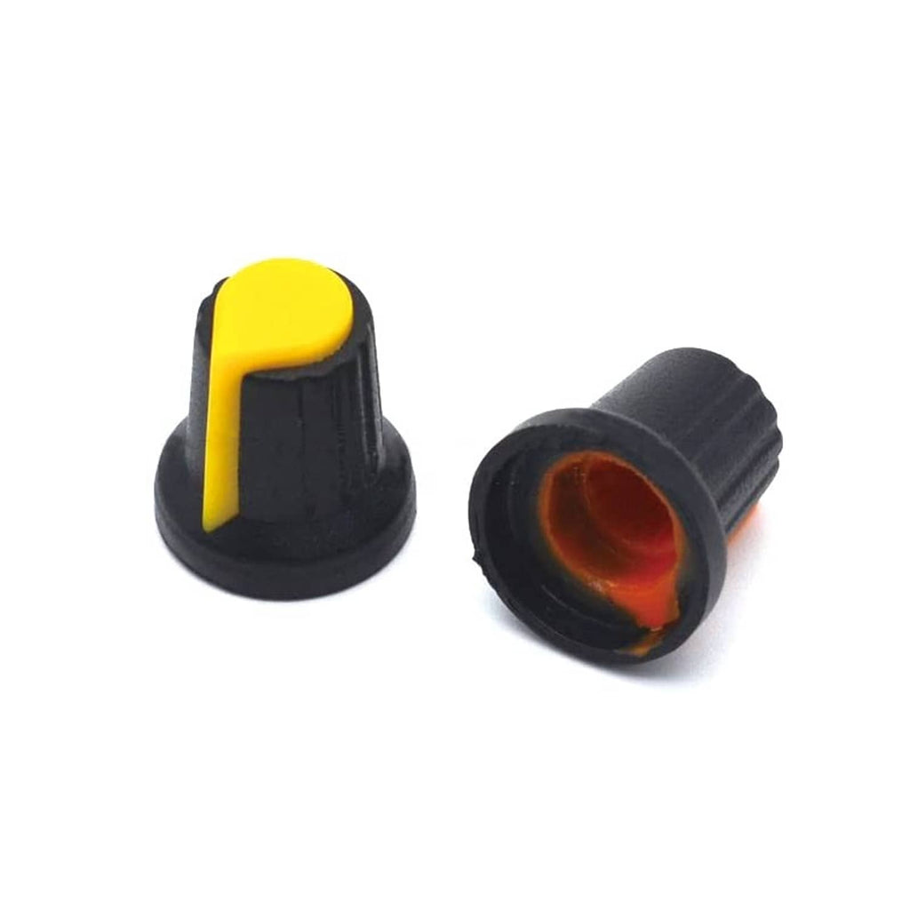 Potentiometer knob switch cap with black base and bright yellow top and inset