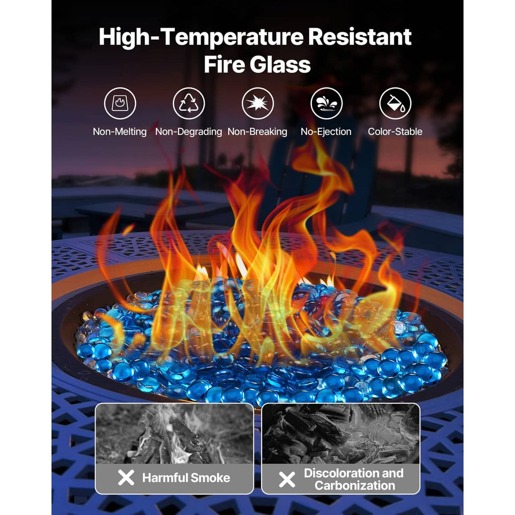 Caribbean blue fire pit glass rocks with bright flames on a round fire glass bead bed