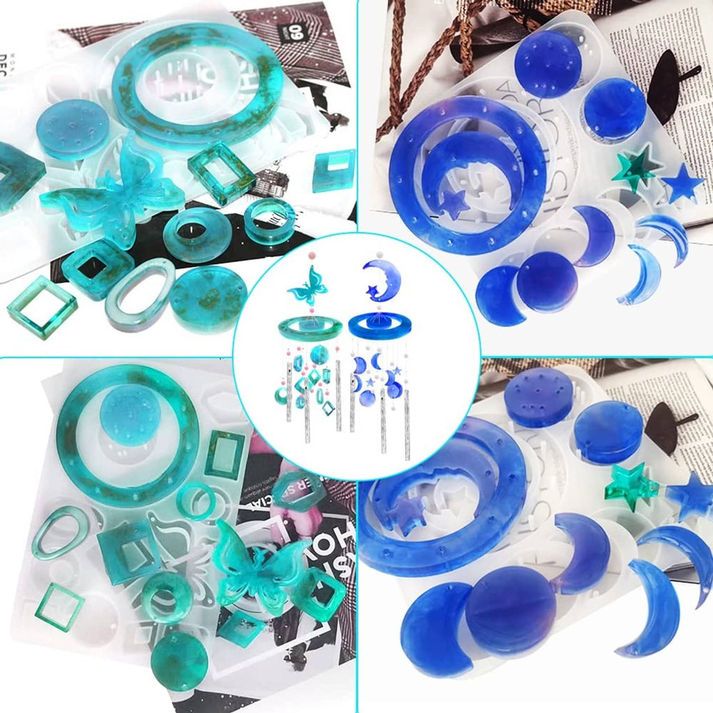 Assorted teal and blue moon wind chime resin mold pieces with silicone forms