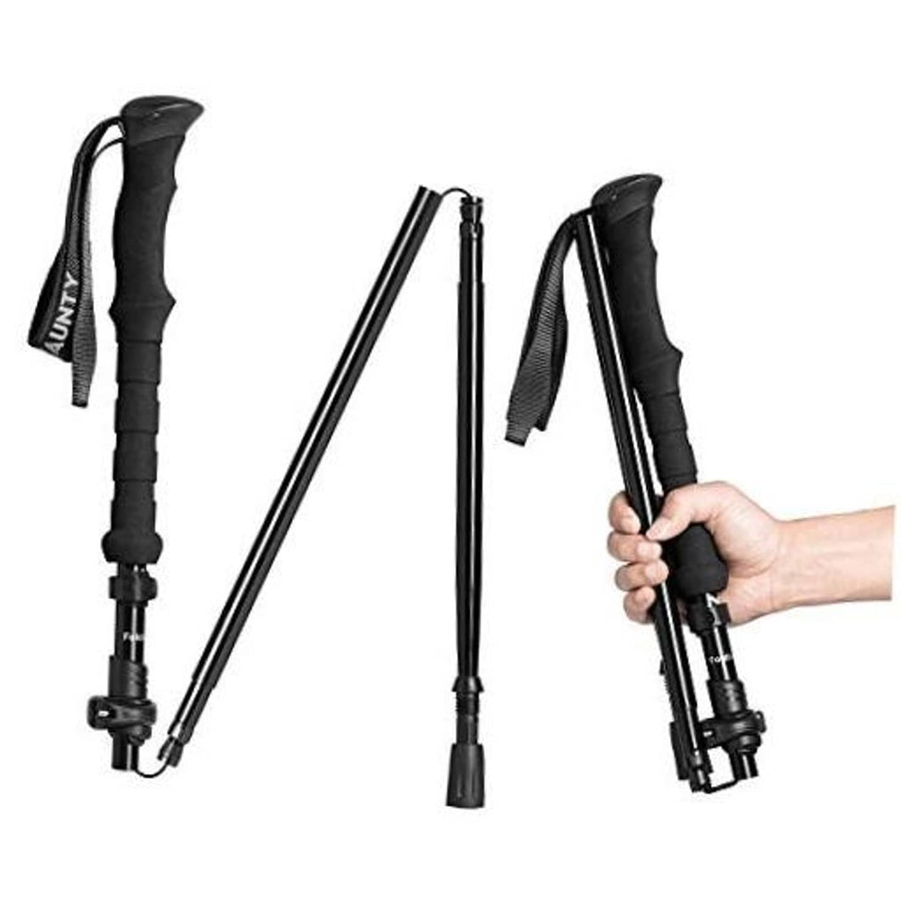 Collapsible trekking pole in dark color with folding handle and wrist strap, extended view