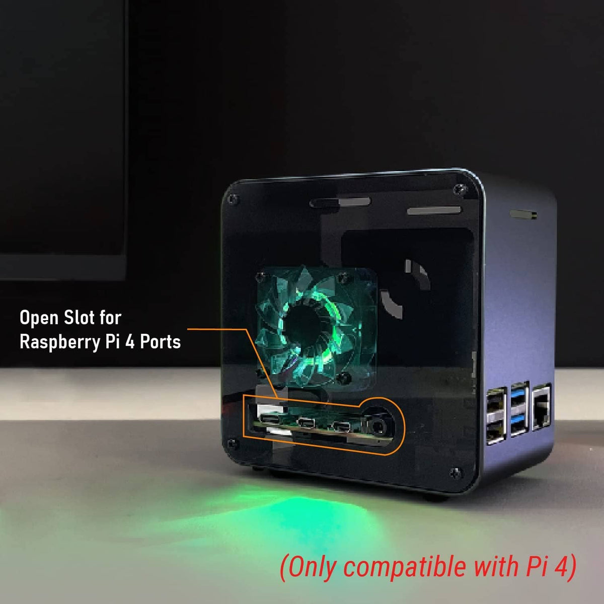 Aluminum Raspberry Pi case with vented open slot and RGB-lit fan through clear panel.