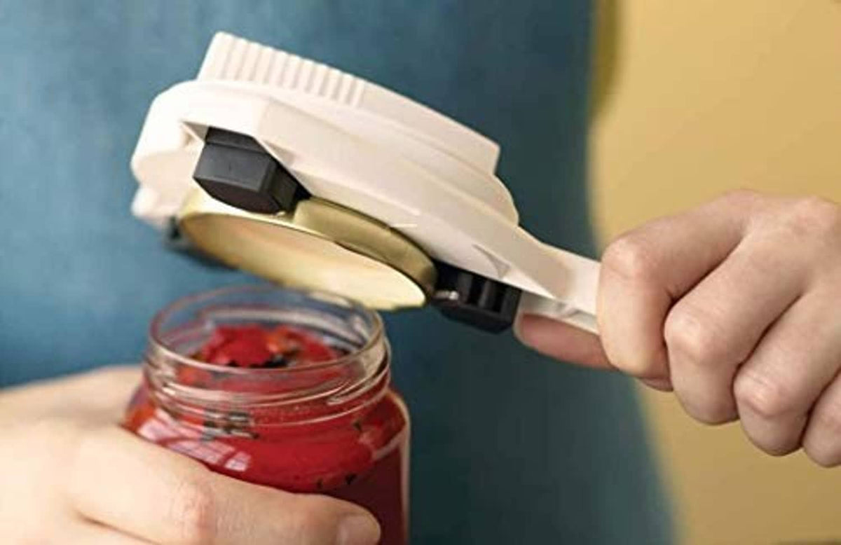 White jar and bottle opener lifting a lid from a glass jar