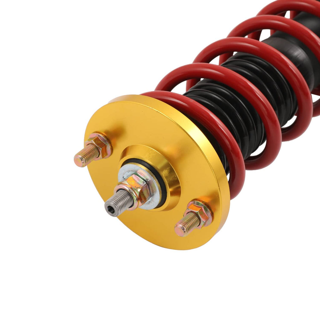 Coilover strut top mount with gold plate, bolts, and red spring