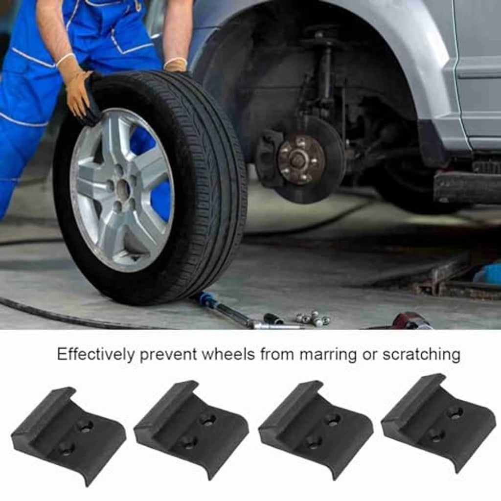 Black tire changer jaw clamp cover set with protective ridges and mounting hole