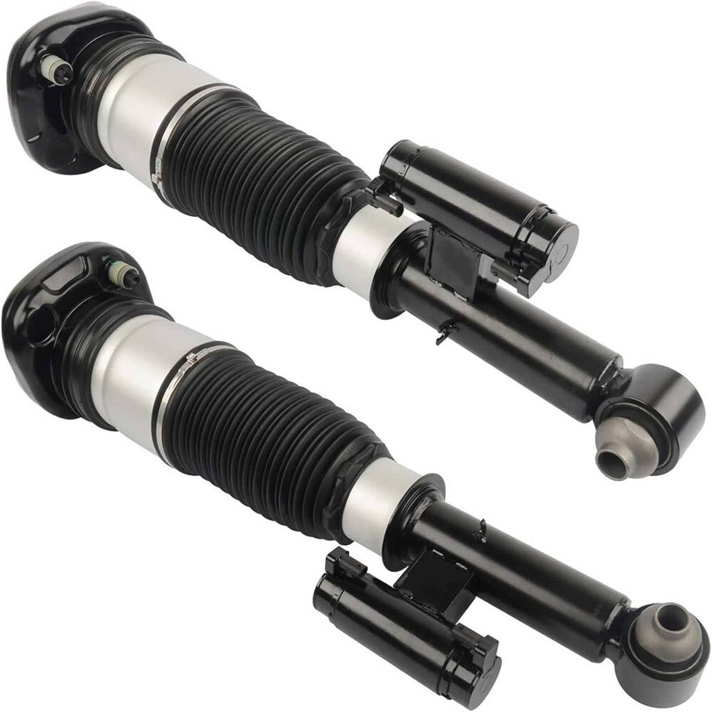 Air suspension struts with black steel housings and ribbed spring boots, front pair