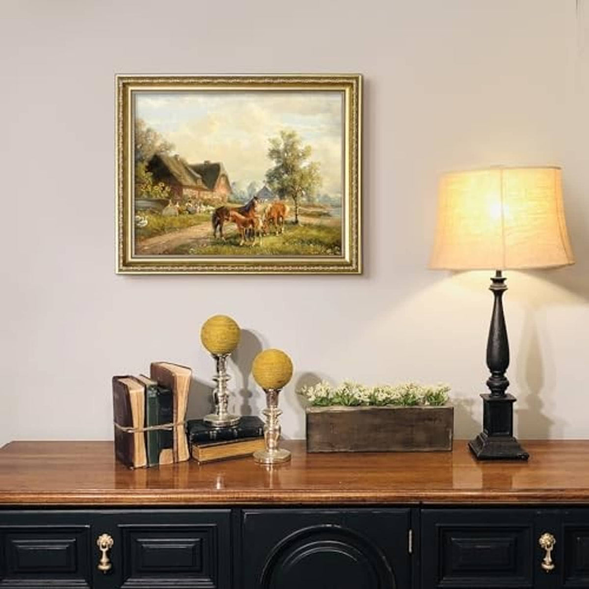 Gold ornate picture frame with real glass displaying a landscape scene