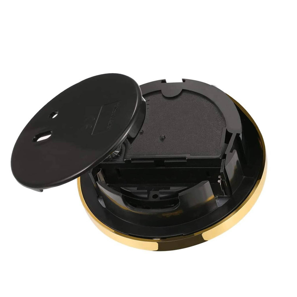 Open round clock insert showing black backplate and exposed internal mechanism with gold rim