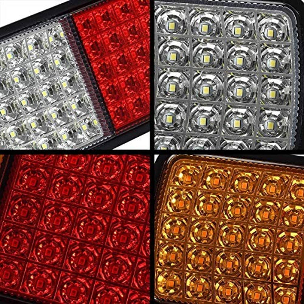 Close-up of rectangular LED tail light lenses in white, red, and amber sections