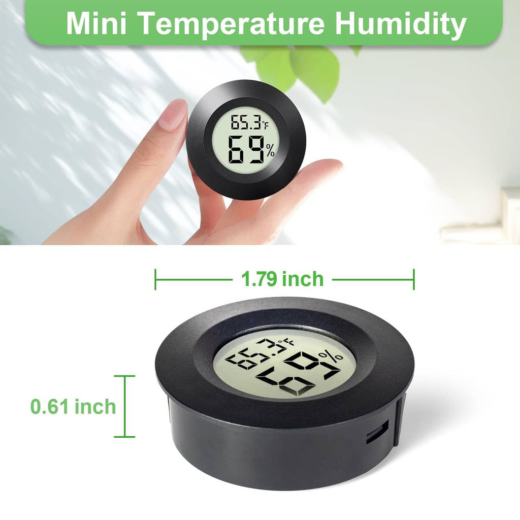 Mini round hygrometer held in hand, black with digital 65.3°F and 69% display