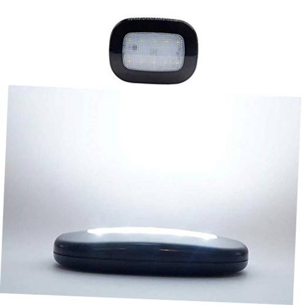Car dome ceiling light with rectangular LED panel in dark housing