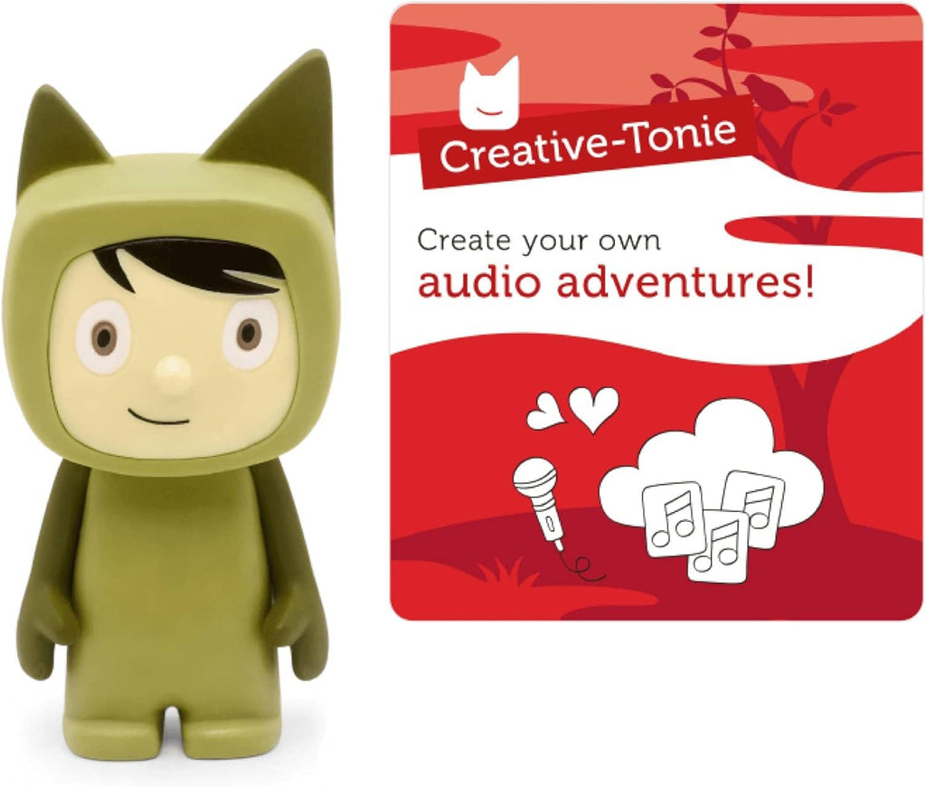 Green cat audio character figurine next to Creative-Tonie audio adventures card
