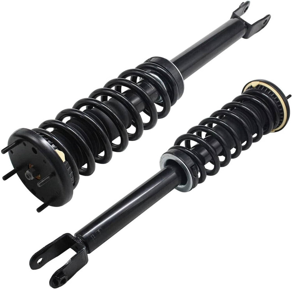 Front shock strut pair with black coil springs, upper mounts, and metal rods