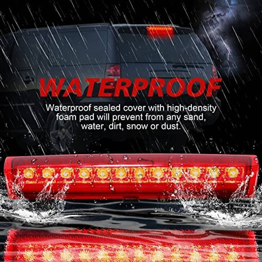 Weatherproof red LED third brake light bar with clear lens shown in rain