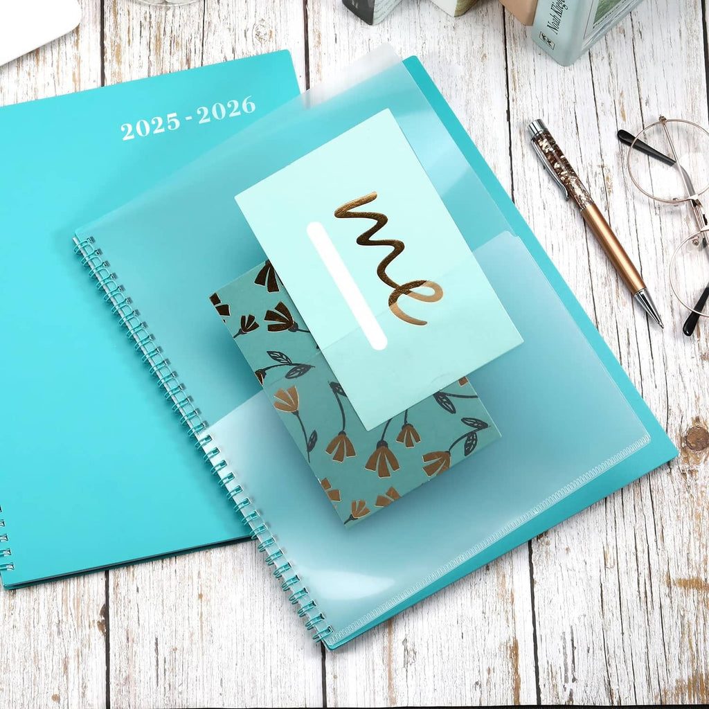 Turquoise 2025-2026 planner with spiral binding and a cover label pocket for cards