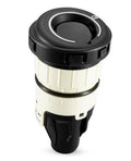 Capless fuel filler cap with black top and cream housing, round fill opening