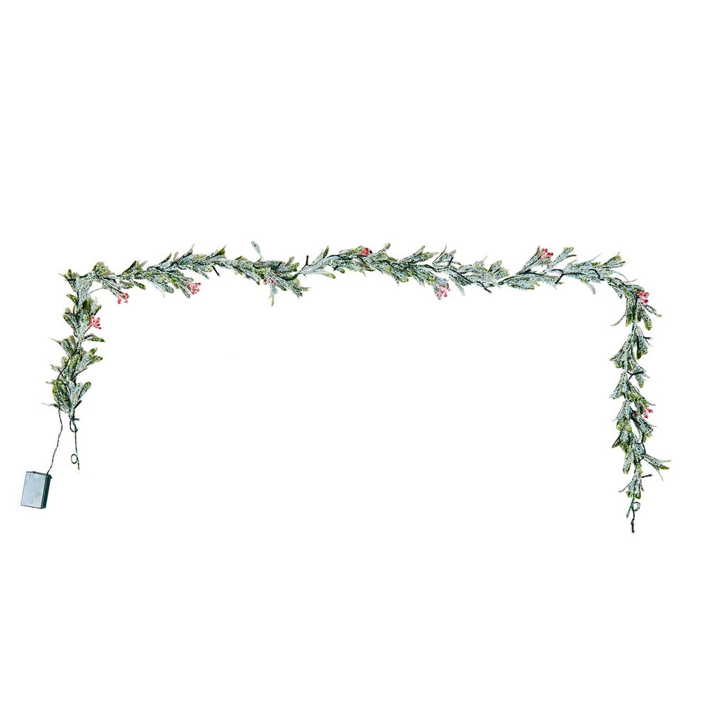 Christmas vine garland with olive leaves, red berries, and warm light string