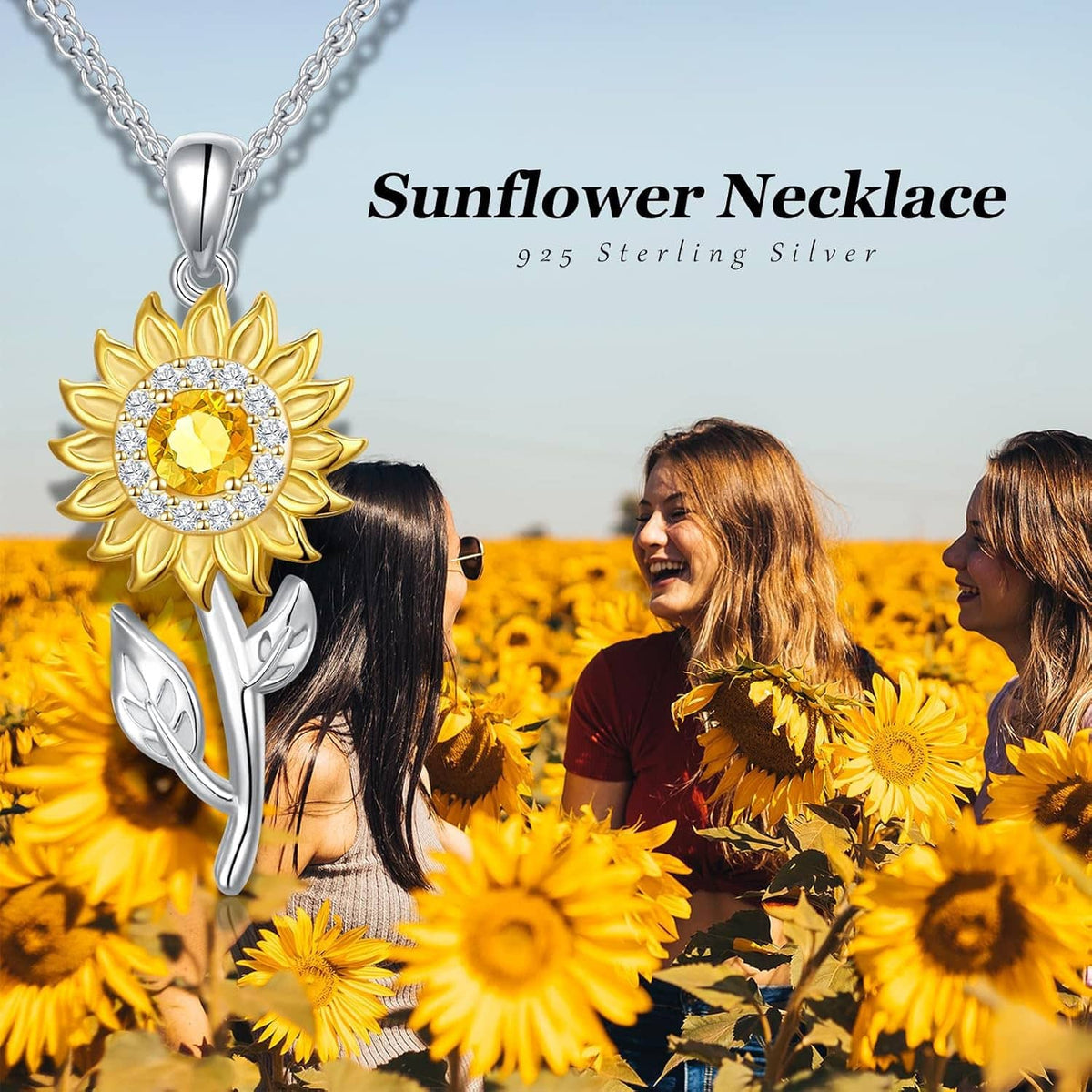 Sunflower pendant necklace with gold petals, amber crystal center, and silver leaves