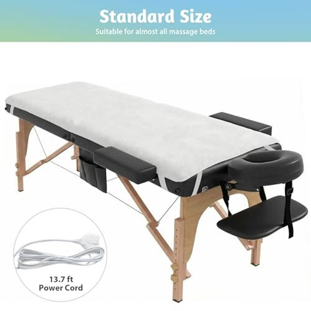 Massage table warmer pad in white on a standard massage bed with black controller