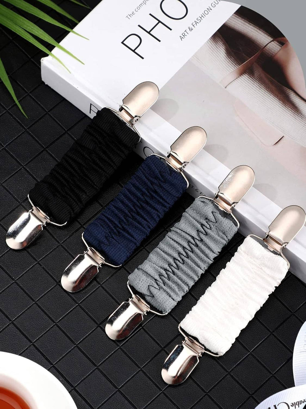Four dress cinch clips with ribbed bands in black, navy, gray, and white