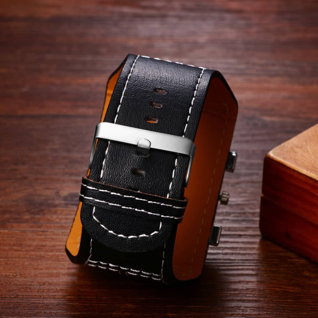 Black leather watch strap with double-row stitching and metal buckle clasp