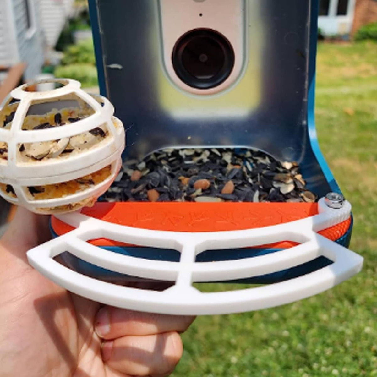 White perch accessory for smart bird feeder, shown next to feeder base