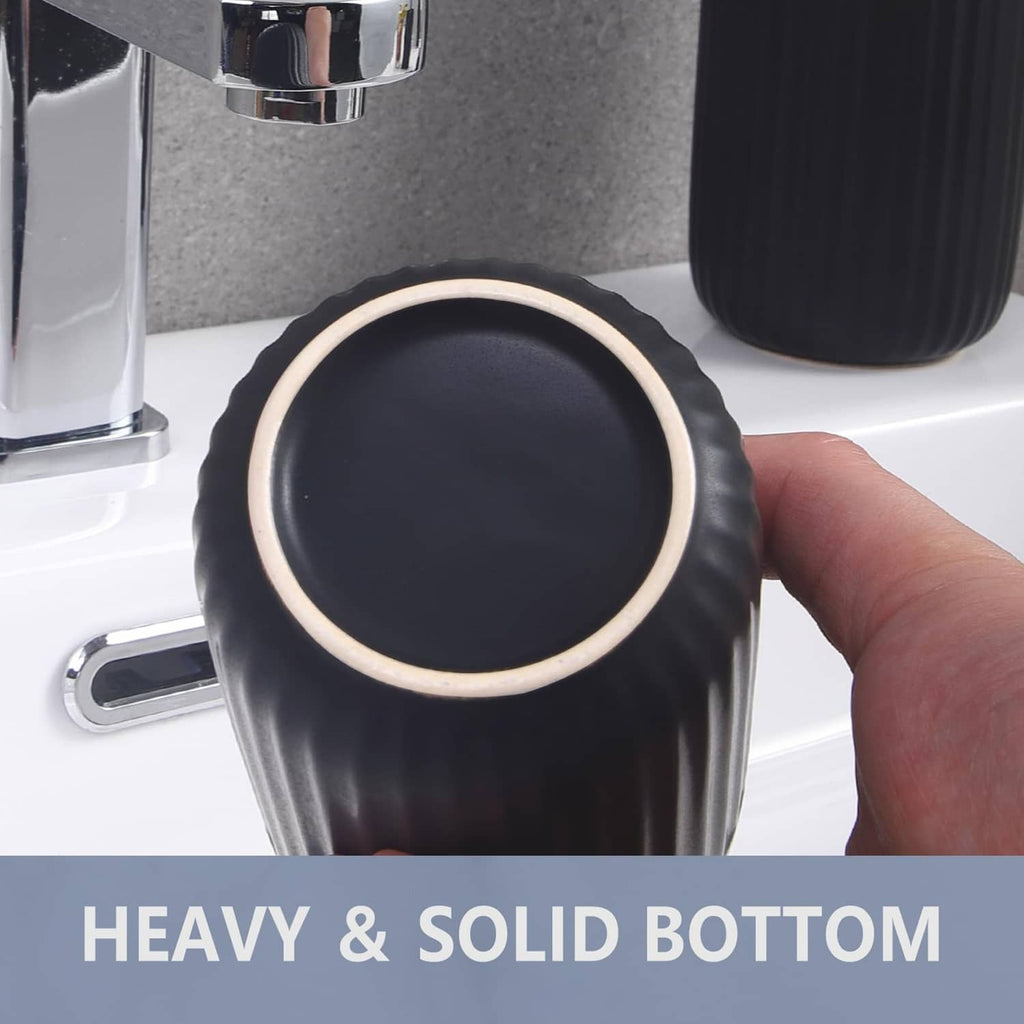Matte black ceramic toothbrush holder shown from above, with thick rim detail and open top