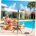 Adjustable outdoor misting stand with black tripod legs and four spray nozzles