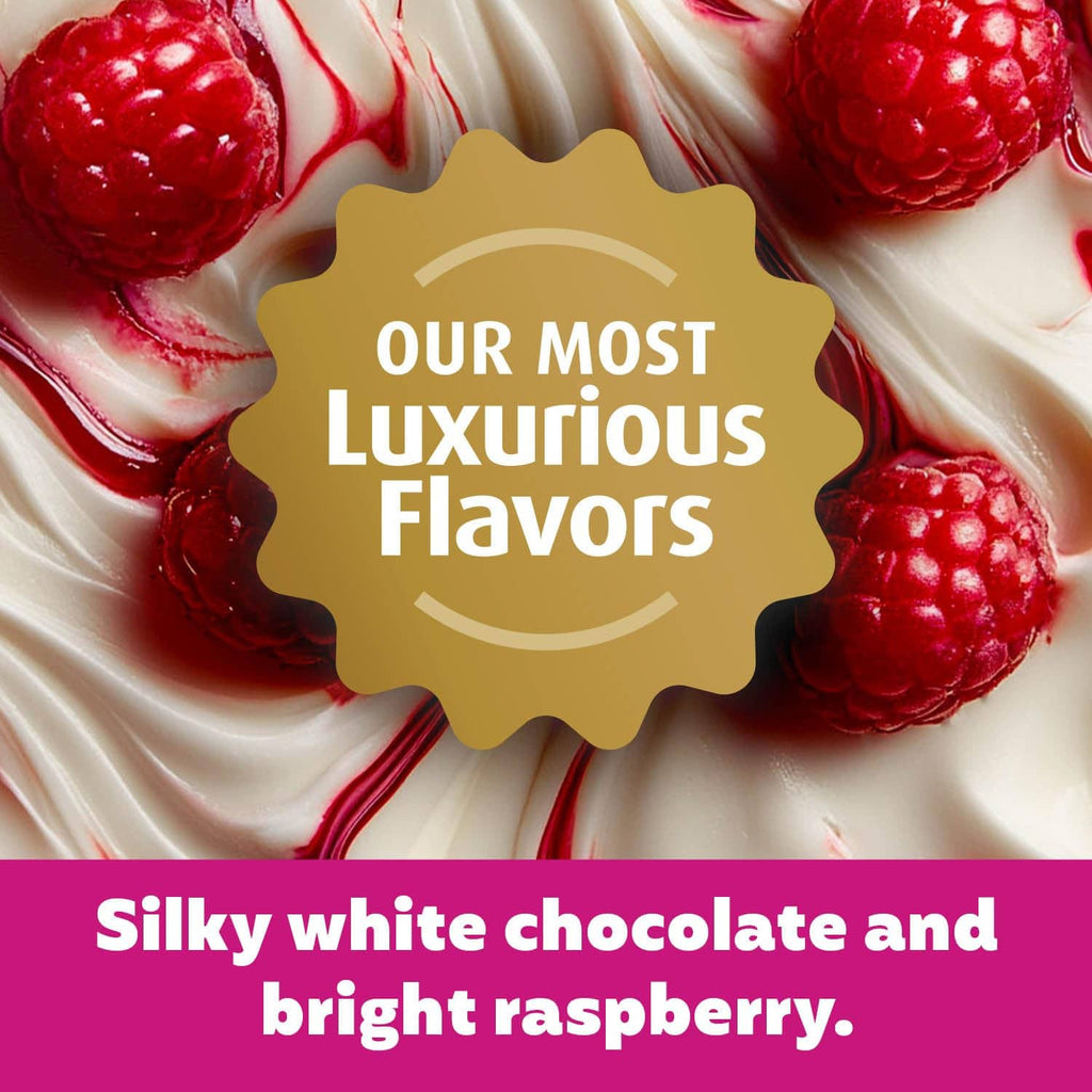 White chocolate and raspberry flavored protein shake label with fruit and drizzle artwork