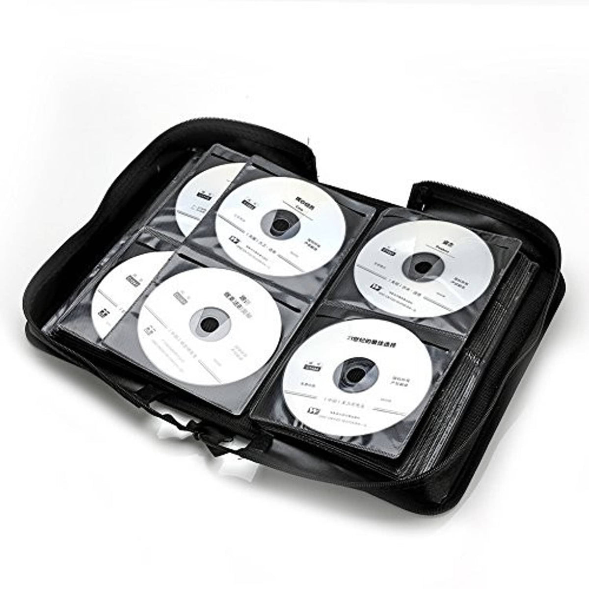 Open black CD/DVD case showing multiple disc slots with CDs and booklets