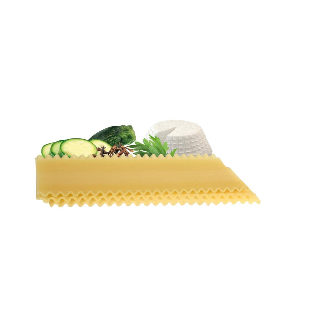 Dried lasagne pasta sheet with vegetable toppings and a cheese-like cap