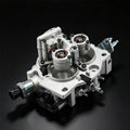 Throttle body assembly with silver housing, intake bores, and electrical connectors