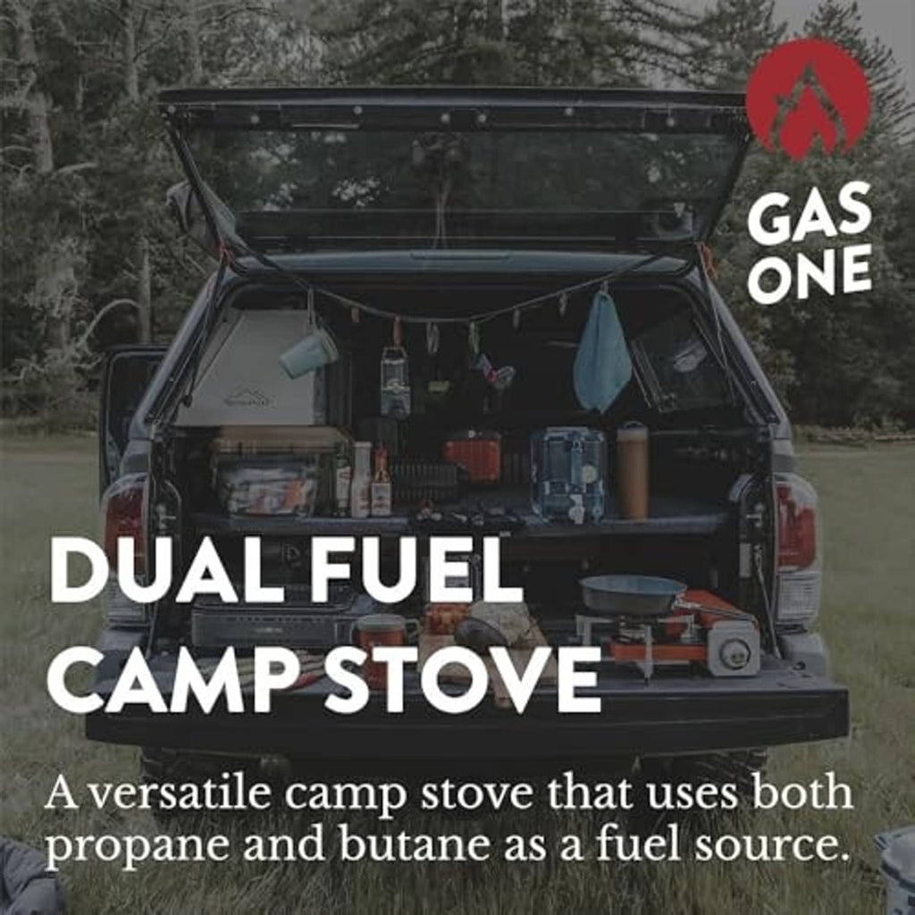Portable dual-fuel camp stove with burner and side control knobs, beige metal housing