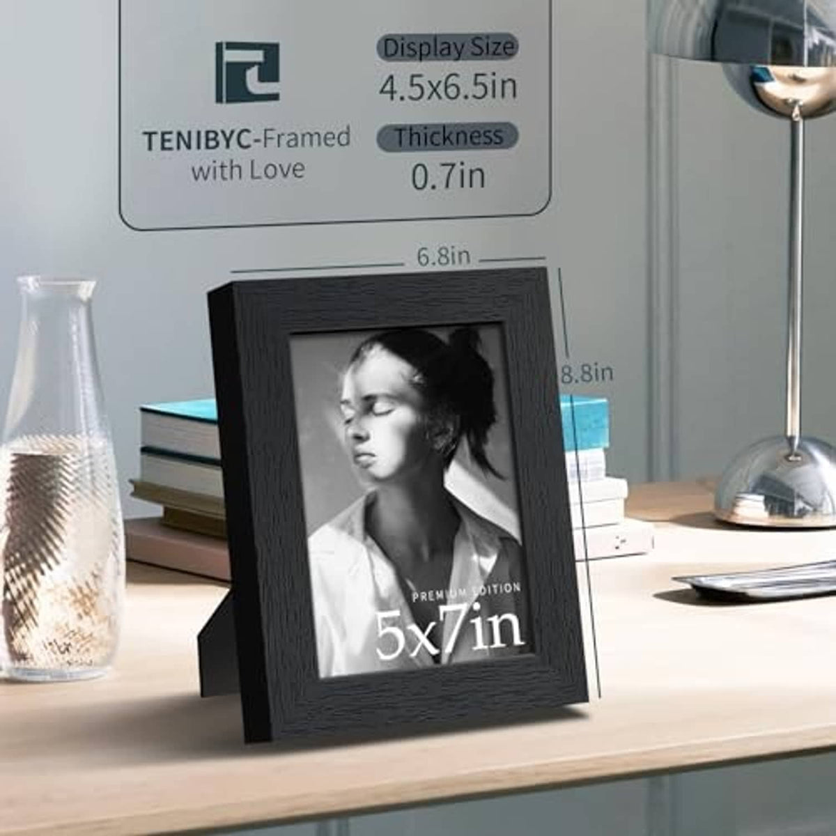 Black woodgrain 5x7 picture frame on tabletop in portrait orientation