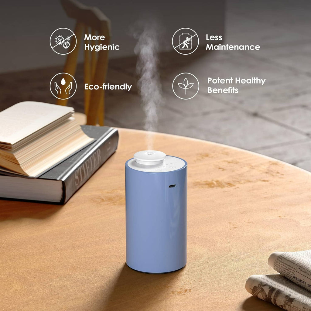 Light steel blue waterless essential oil diffuser on a tabletop