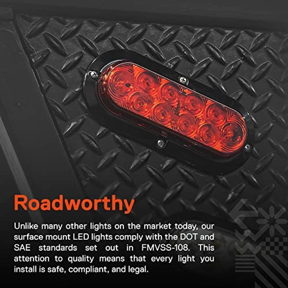 Oval red LED trailer tail light with clear red lens mounted on black diamond plate