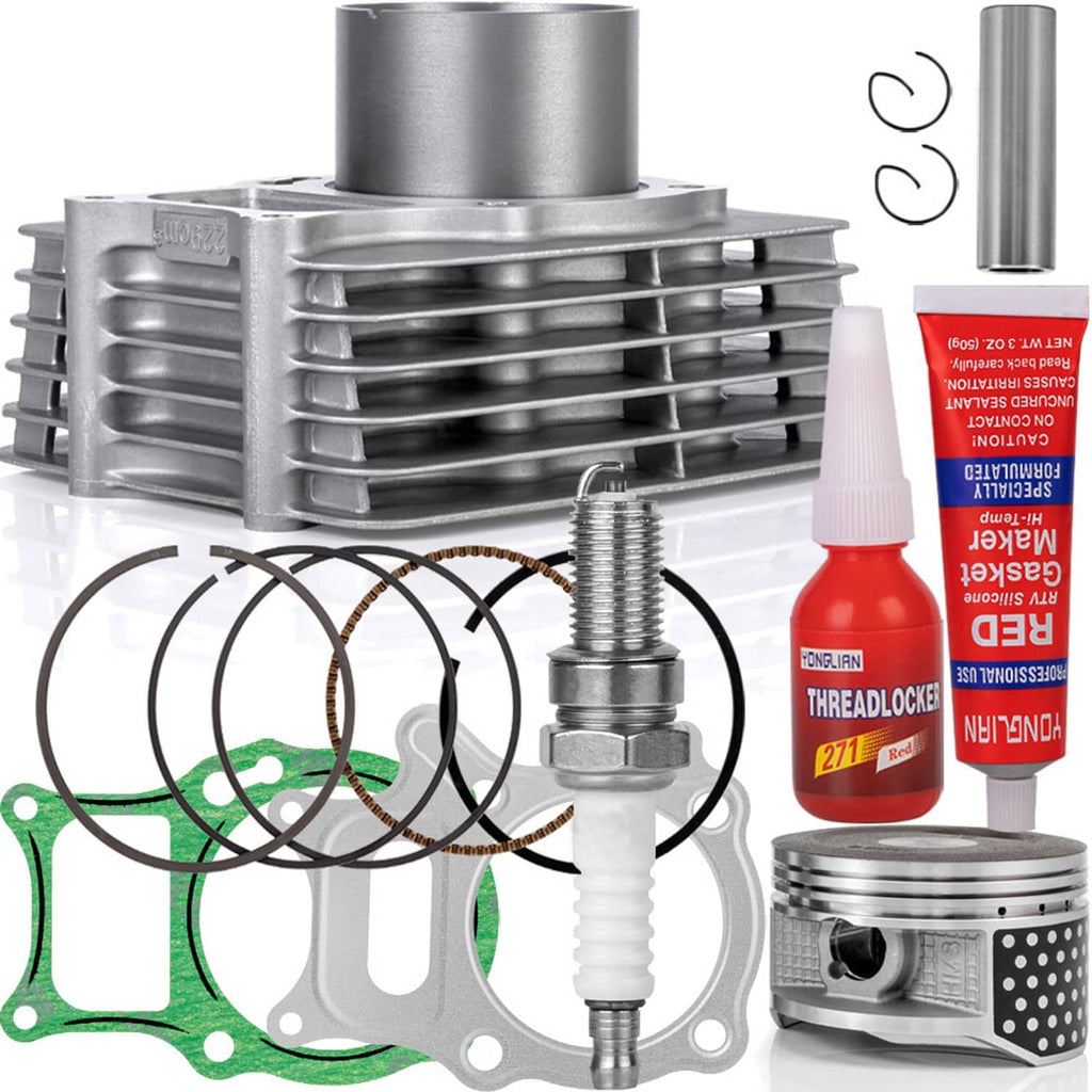 Engine top end kit with silver cylinder head, piston, rings, and green gasket