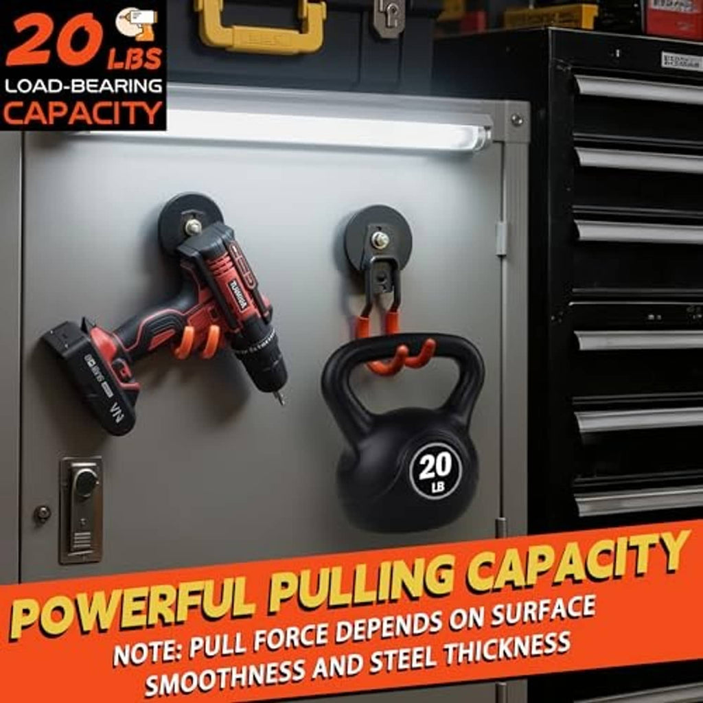 Orange magnetic hooks mounted on a gray metal tool cabinet holding cords and tools