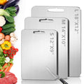 Silver titanium cutting boards set of three with hanging handle cutouts