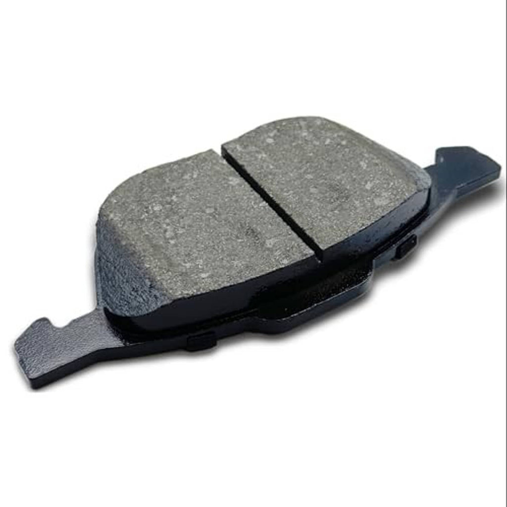 Ceramic brake pad with gray friction material and black backing, angled view