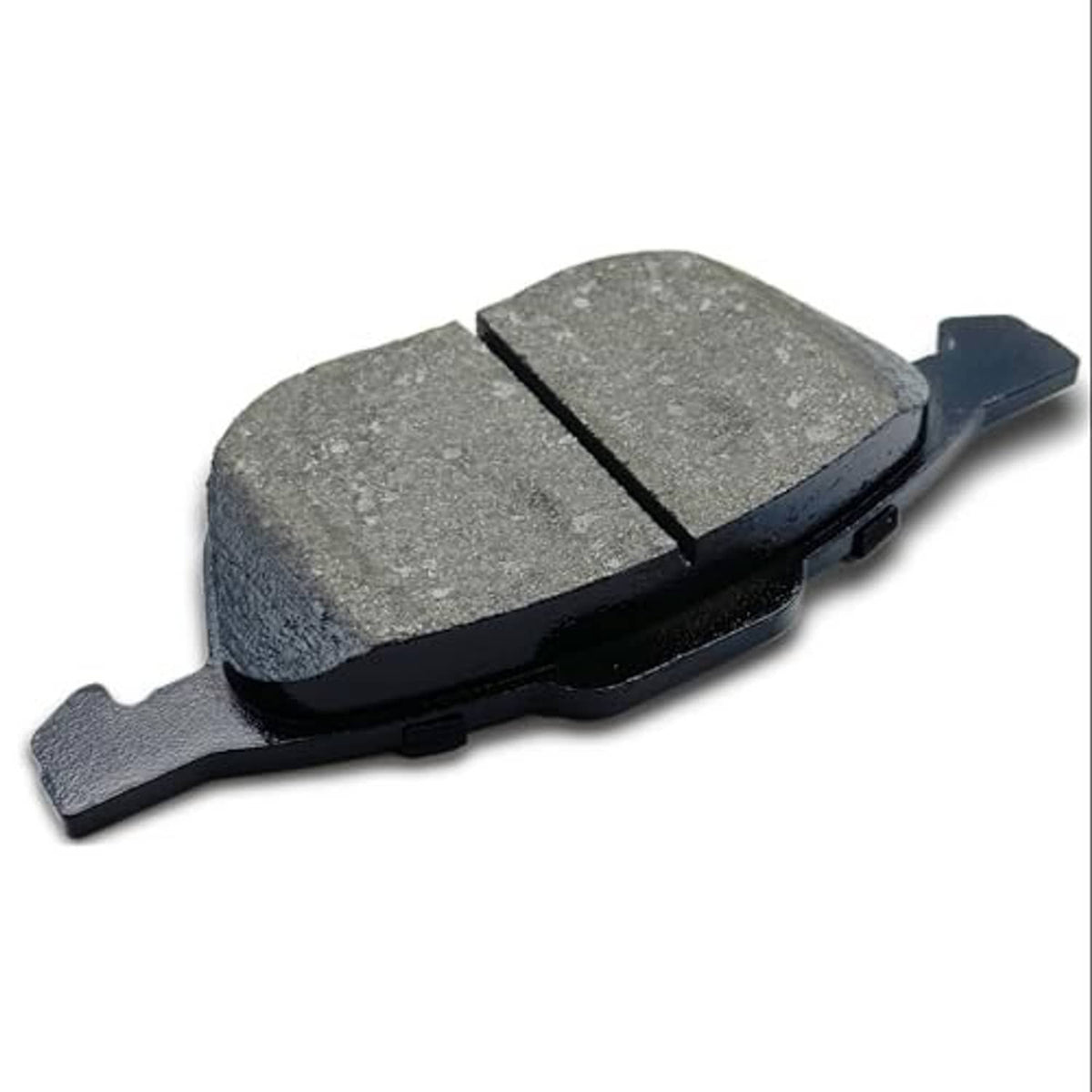 Ceramic brake pad with gray friction material and black backing, angled view