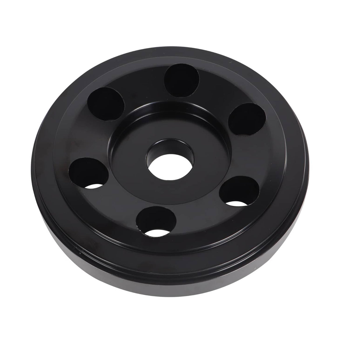 Black pulley-style bushing plate with central bore and evenly spaced bolt holes